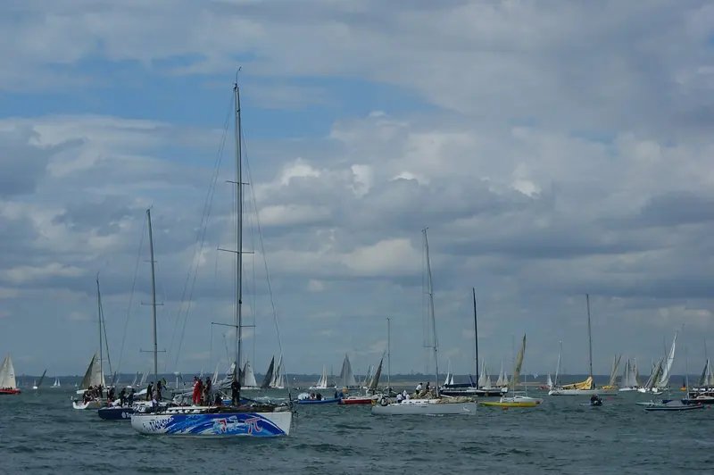 The Solent off Cowes crowded with racing yachts during Cowes Week, the regatta Cowes Yacht Haven serves as shore base for every August.