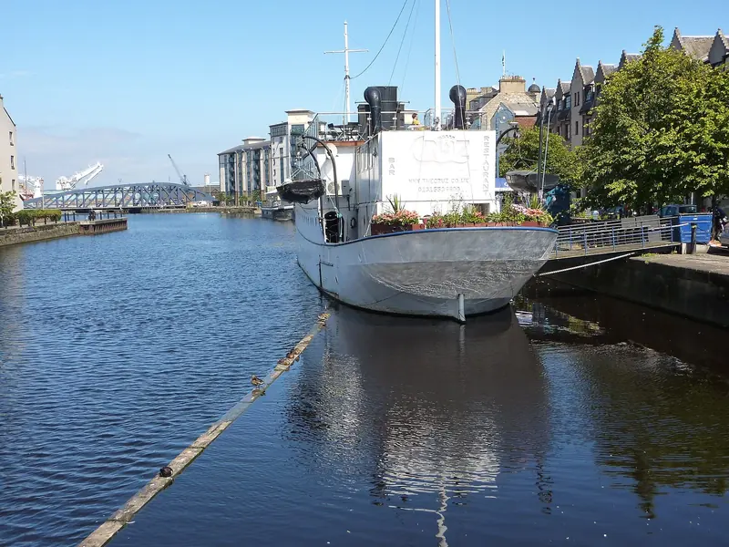 The preserved steam yacht Ocean Mist moored on the River Medina below the town, one of the historic vessels based around Cowes.