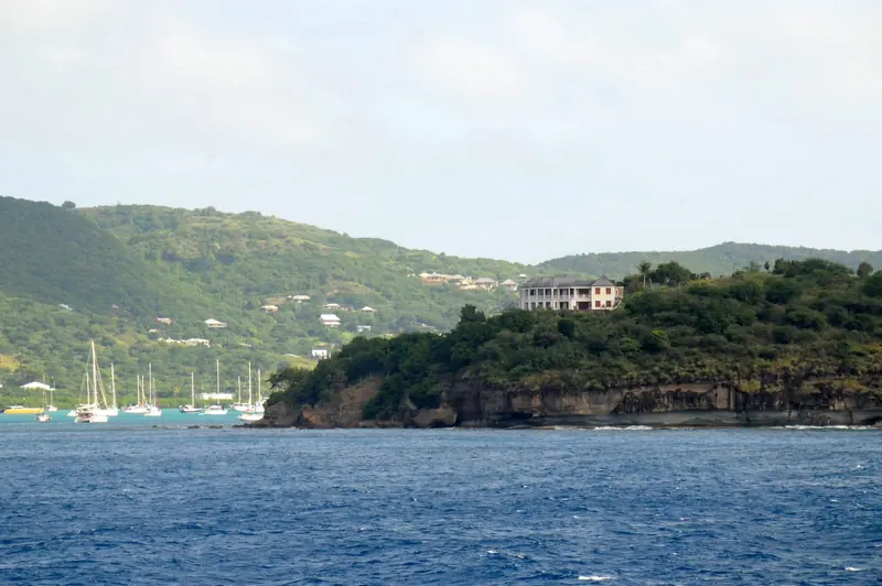 Looking east across Falmouth Harbour to Harbour Hill. This is the bigger and more open of the two, which is why the largest yachts lie here.