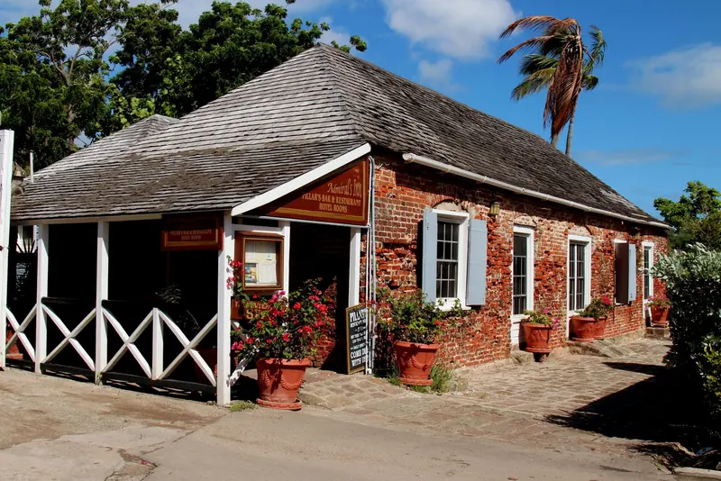 One of the Georgian dockyard buildings. What is ashore at English Harbour is a large part of what an owner is buying by berthing here.