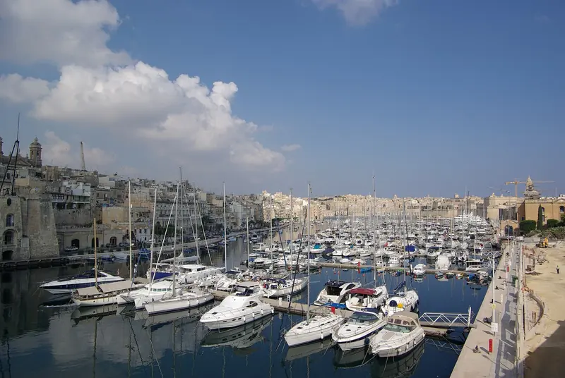 The water between Senglea and Vittoriosa, where the pontoons fill the old dockyard creek.