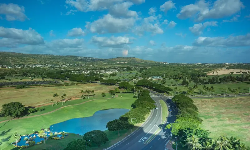 Ko Olina's golf course and one of its ponds border the access road into the resort, the amenity most visiting boat owners reach for after a day on the water.