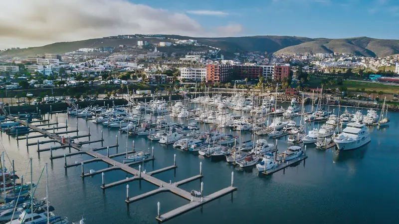 Looking landward across the full slip basin toward the hotel and the town of Ensenada spread over the hills beyond.
