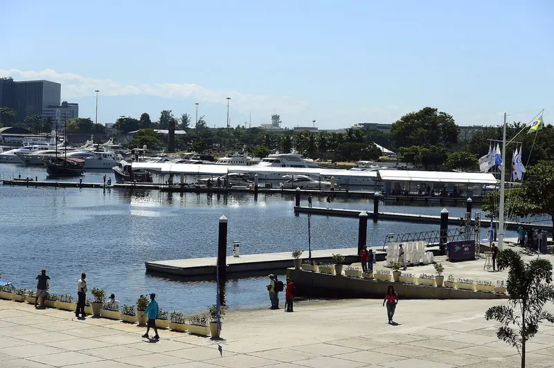 Superyachts on the reopened pontoons at the April 2016 relaunch, weeks before the marina hosted Olympic sailing, with the Cidade Olimpica banner still standing on the quay.