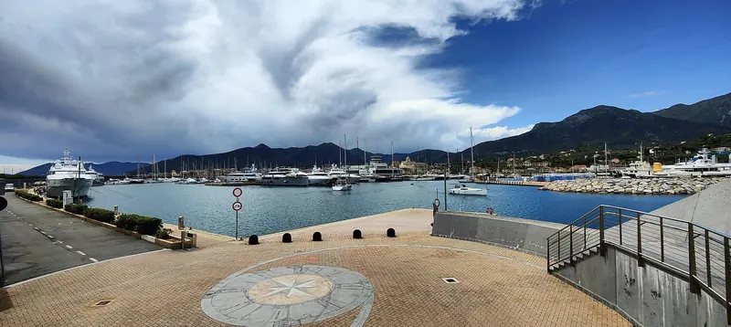 The entrance channel into Marina di Loano, boats queuing to come alongside.