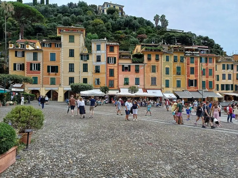 The Piazzetta opens straight off the quay, putting the cafe tables and the village shops within a minute of the boats.