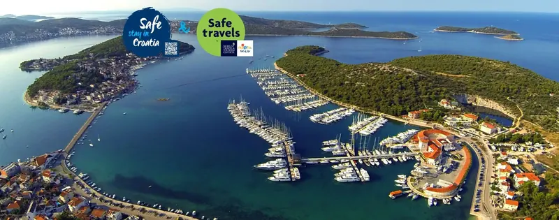 Marina Frapa from the air, the breakwater and piers filling the sheltered bay at Rogoznica between Split and Sibenik.