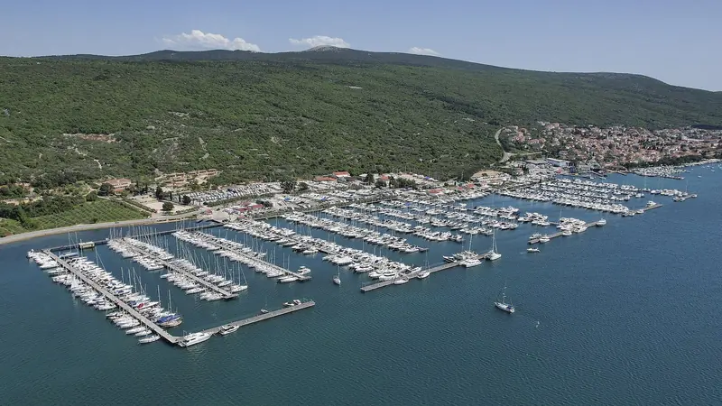 Marina Punat from the air, pontoons filling the sheltered Puntarska Draga bay on the island of Krk.