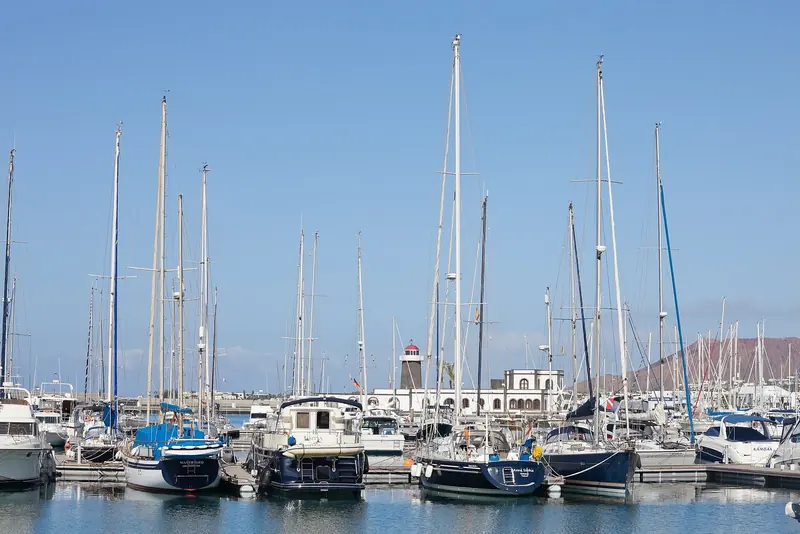 Rows of yacht masts fill the main basin at Marina Rubicon.