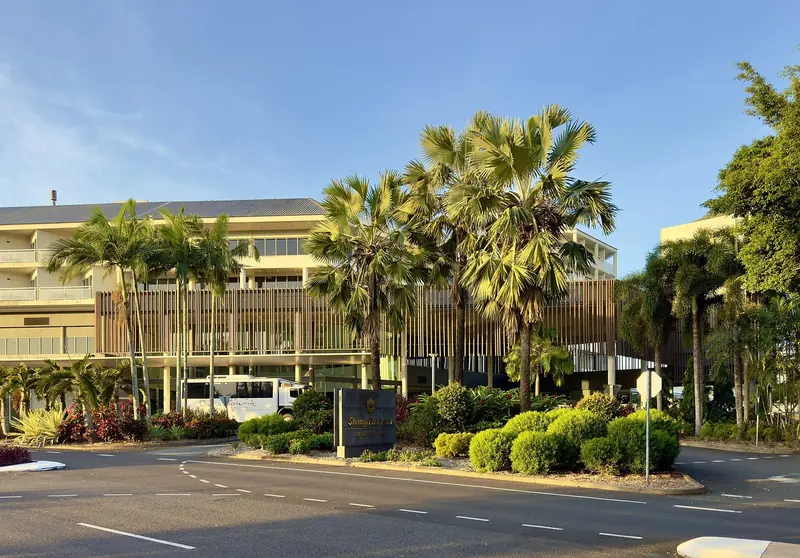 The hotel on the marina front. What is ashore at Cairns is a working tropical town, not a resort built around the berths.