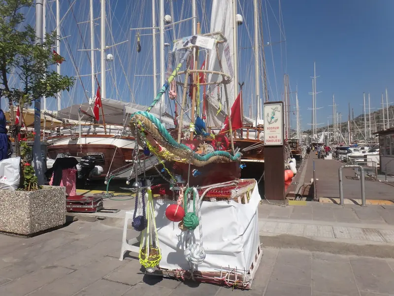 A gulet alongside the quay, rigged and waiting. Bodrum builds these boats as well as berthing them.