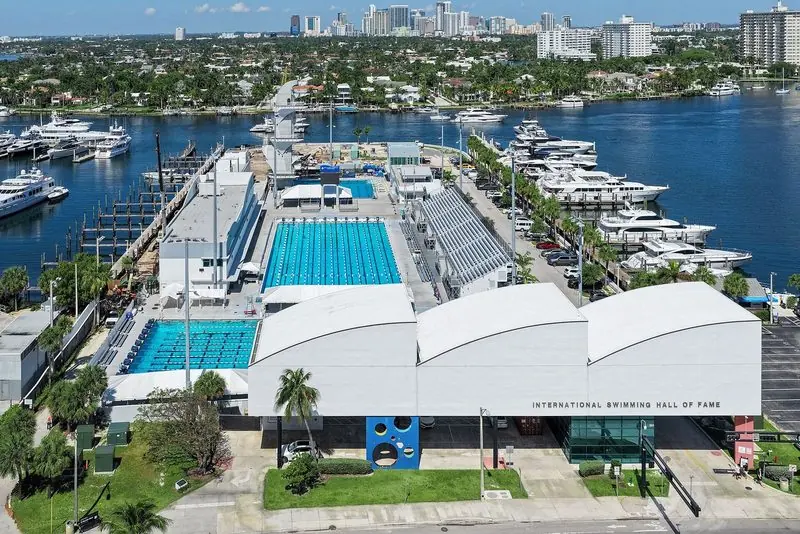 Seen from the air, large yachts line both banks of the Intracoastal Waterway at Fort Lauderdale with the downtown towers standing a short way inland.