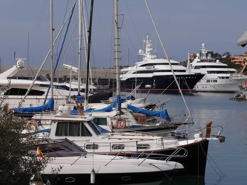 Larger motor yachts alongside. The berths that take this size are a small share of the marina and they are the ones that are hard to get.