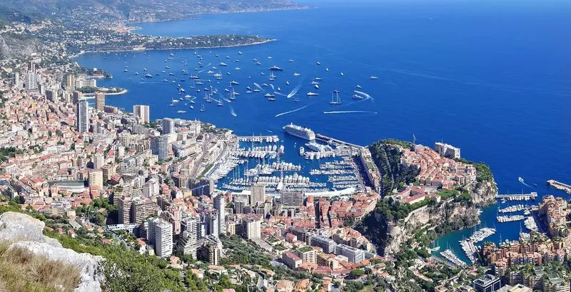 Monaco seen from the hills above the principality, with Port Hercule cut into the middle of the city.