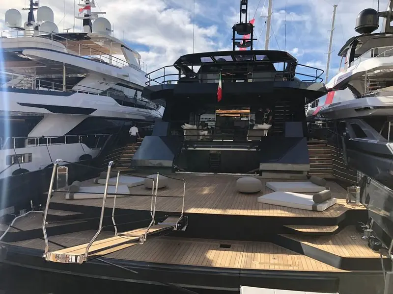 Yachts berthed close aboard in the inner harbour, where the space between hulls is measured in metres.