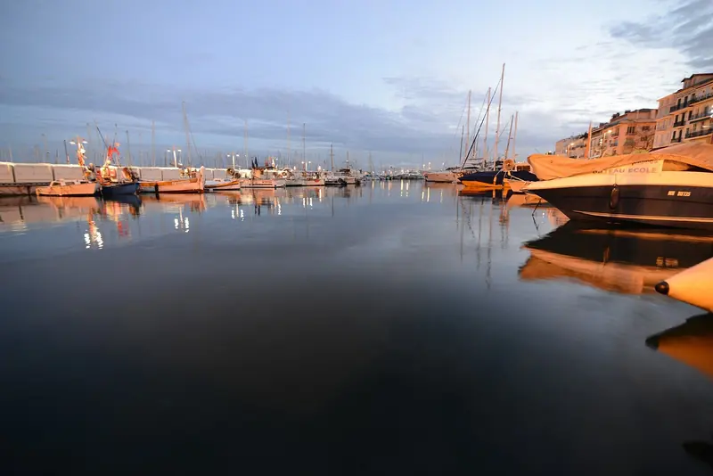 The Vieux Port at first light. Fishing boats and day boats share the basin with the yachts all year.