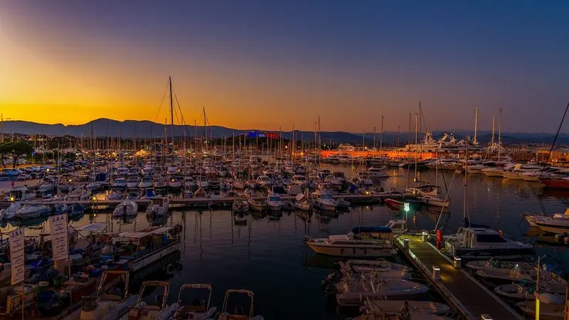 Dusk over Port Vauban, one of the largest marinas in the Mediterranean by berth count.