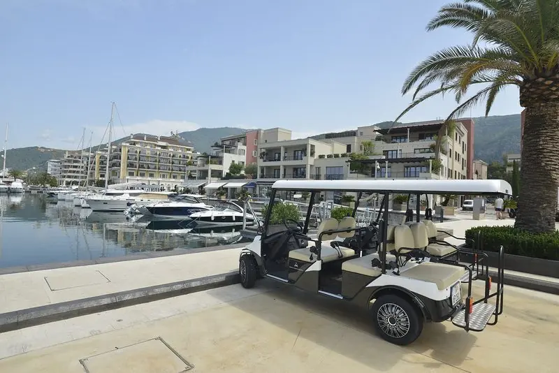 The promenade, where guests move around the village by electric buggy.