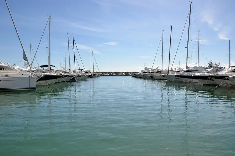 Sailing yachts on the inner pontoons, the quiet end of the basin.