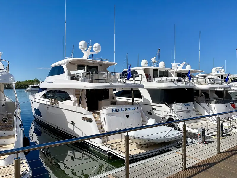 Sanctuary Cove Marina. The berths sit inside a canal estate on the Coomera River, well back from the open sea, which is both the attraction and the limit.