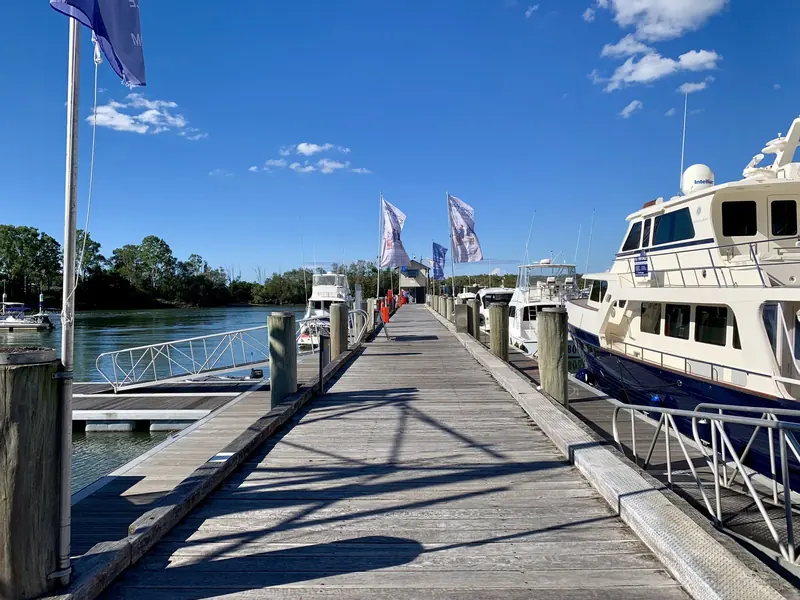 Down a finger between the berths. The pontoons are wide and the fingers are long, which suits the beam of the local fleet.