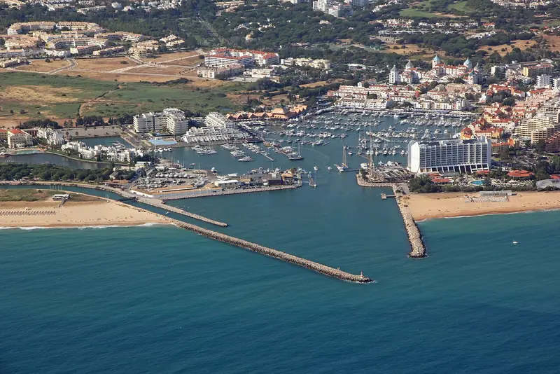 Vilamoura from the air. The marina is the centre of a purpose-built resort rather than an old harbour, and the scale of it is the first thing to understand.