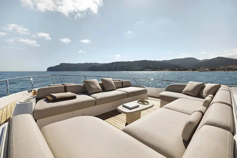 The forward cockpit seating area, a second entertaining space ahead of the wheelhouse that most flybridge yachts this size do not offer.