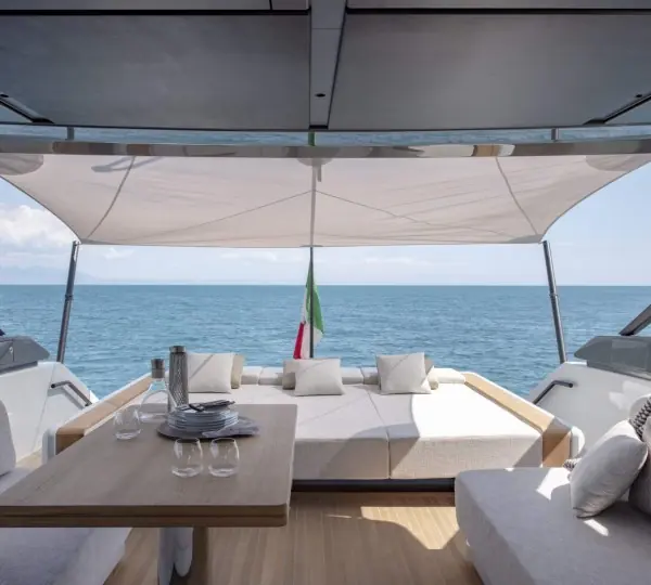 The BG72's flybridge sun bed and shade awning, deployed at anchor.