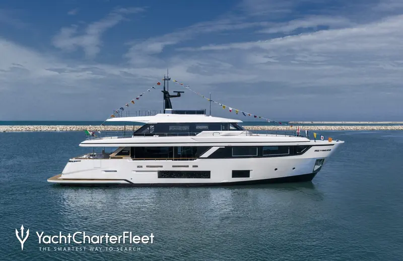 The Custom Line Navetta 30 under way, from a YachtCharterFleet listing for hull Project/25.