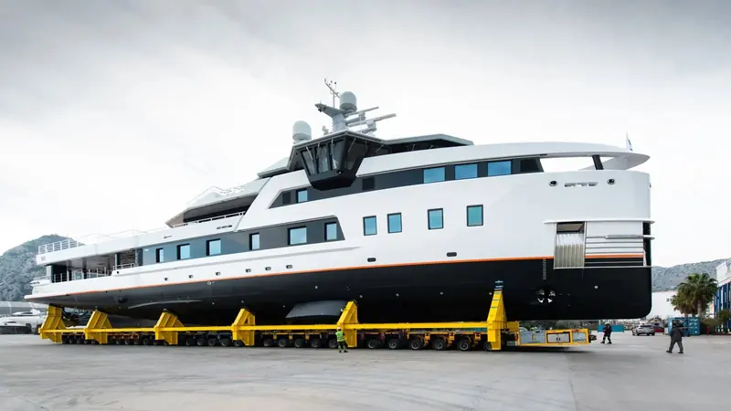 After You's hull is lifted onto its transport cradle at the Damen Yachting facility.