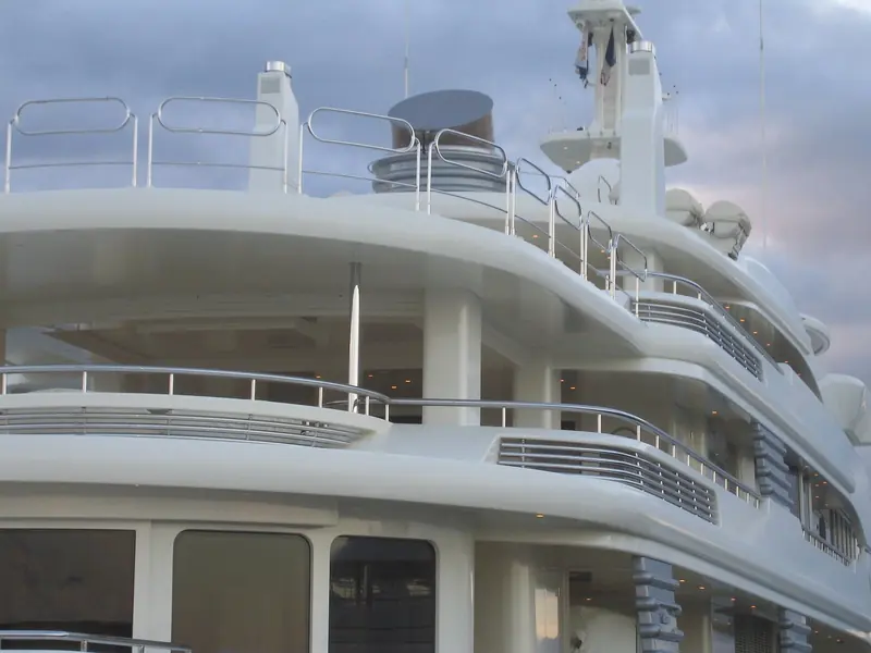 Looking up at the mast and sensor array from the sundeck - radar scanners, satellite domes and navigation antennae clustered above the top deck.