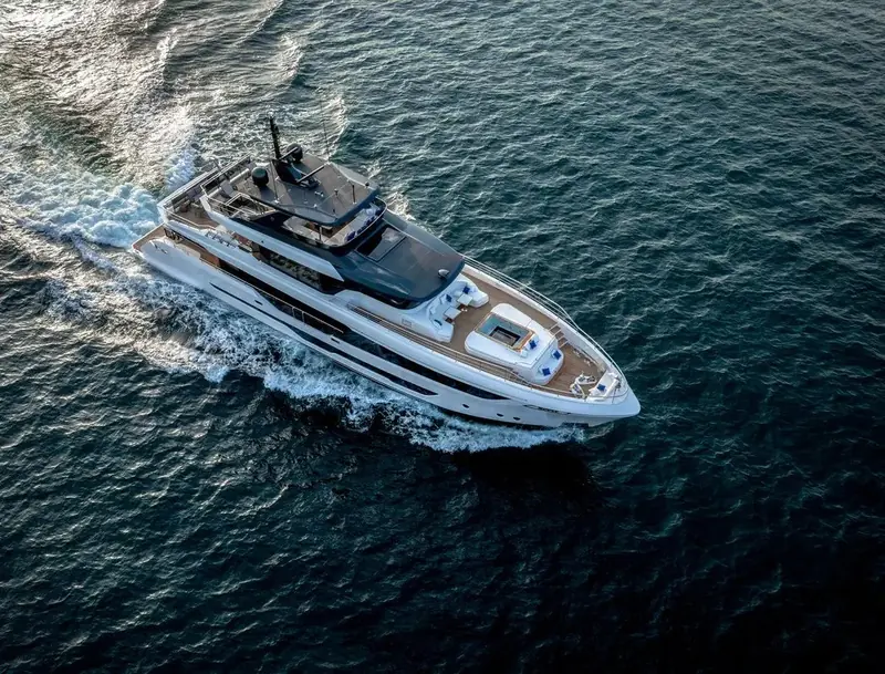Running hard from directly overhead, the drop-down terraces closed and the foredeck sunpad empty for the passage.