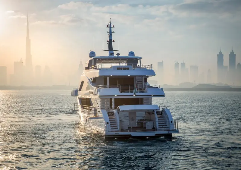 Majesty 140 approaching the Dubai skyline, the model that sits between Gulf Craft's mid-size Majesty range and the full-custom 175 flagship.