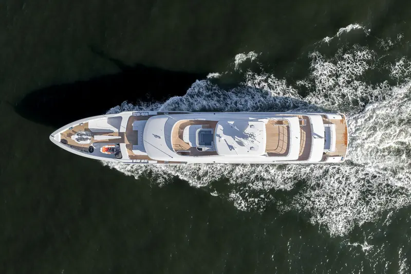 An aerial three-quarter view astern, the Dutch ensign flying from the staff, taken during the same delivery cruise that preceded her Mediterranean handover.