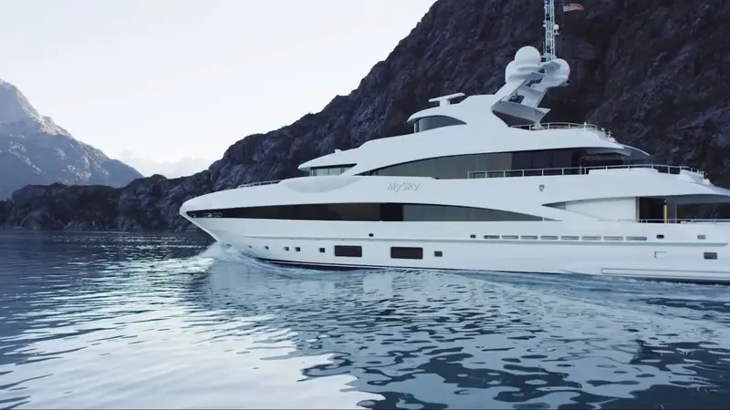 My Sky idling past a rock face in Alaska, one of several Heesen-built yachts whose owners run expedition-style itineraries rather than staying in the Mediterranean and Caribbean charter circuit.