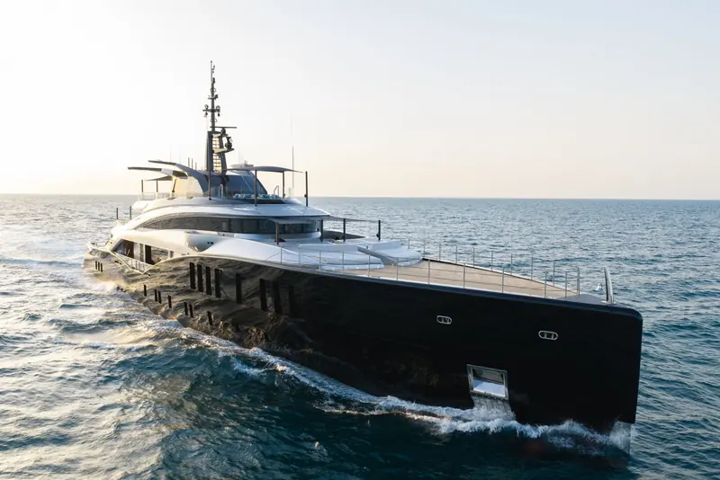 Sea Raider X running at sunset shortly after delivery, the black steel hull and silver aluminium superstructure Vallicelli Design drew for ISA's new 67-metre flagship.