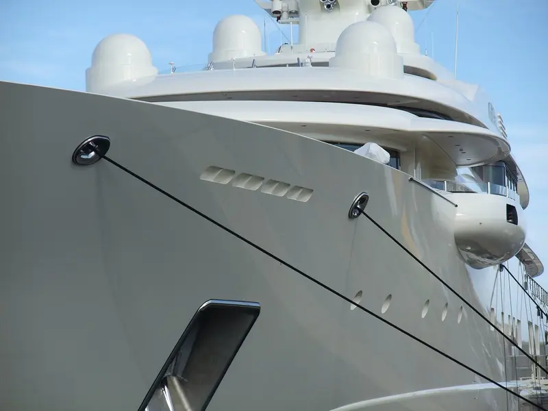 A close view of the bow, showing the anchor pocket and the flared hull form Lurssen used to keep the motion comfortable at this length.