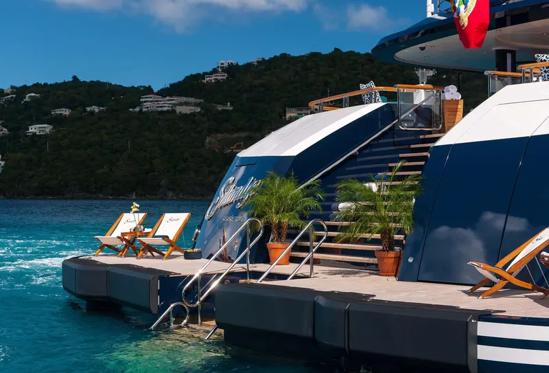 The beach club transom off St John, US Virgin Islands, with Solandge's name and George Town port of registry lettered on the swim platform above the folding bathing steps.