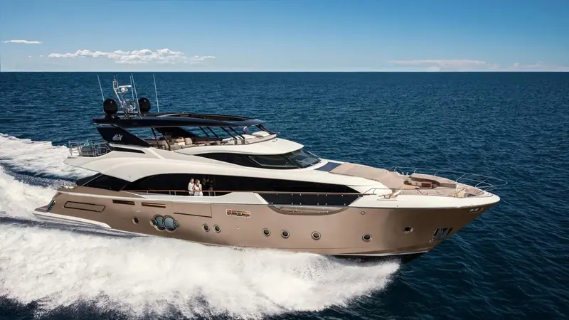 Mia, the first MCY 96 hull, running hard at launch in summer 2017 with owners on the main-deck aft terrace.