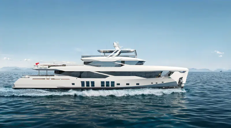 Underway off a mountainous coastline, the faceted hull sides and tender garage transom that define the XP explorer line's silhouette.