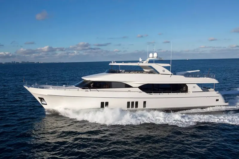 Full broadside profile underway near Fort Lauderdale, showing the raised pilothouse windows and low-slung sheerline.