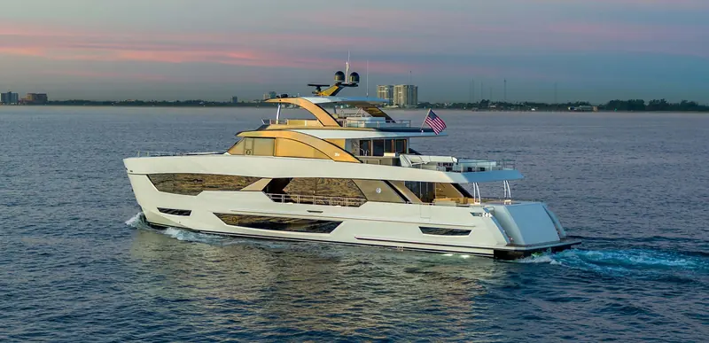 The Ocean Alexander 35R under way off Fort Lauderdale at dusk, showing the flagship Revolution series wave-piercing bow.