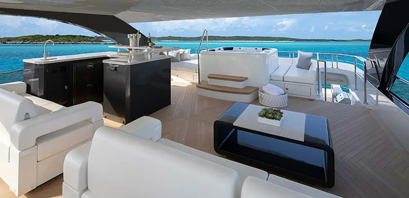 The 35R's aft deck lounge and outdoor bar, overlooking a Bahamian anchorage.