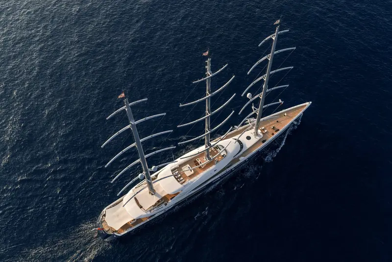 An overhead view showing the full 106.7-metre waterline length and the beam carried well aft, a hallmark of Oceanco's hybrid hull form for this yacht.