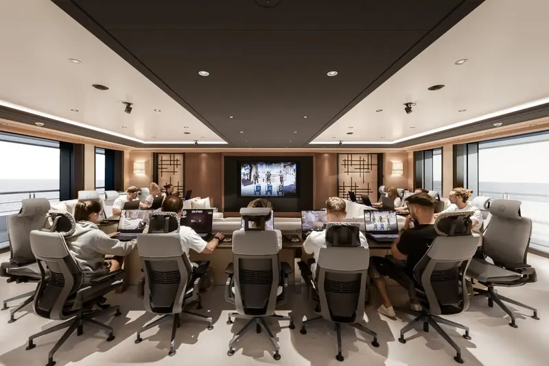 Crew using the high-spec gaming lounge, one of the spaces Oceanco built into what would traditionally be guest-only deck space as part of Newell's crew-first design brief.