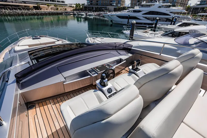 Foredeck seating and the sculpted windscreen surround that carries the 8X's sportscar-influenced design language.