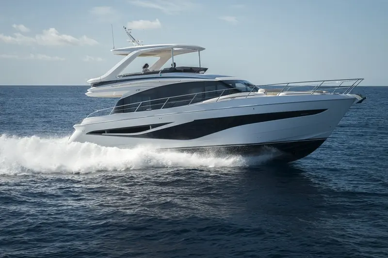 Full profile under way, the dark hull window strip and reverse sheer that mark out Princess's current F-Class styling.