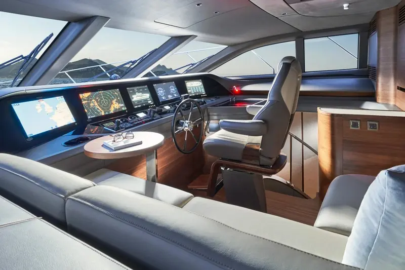 The lower helm, twin displays and a proper chart table behind the wheel rather than a single multifunction screen.