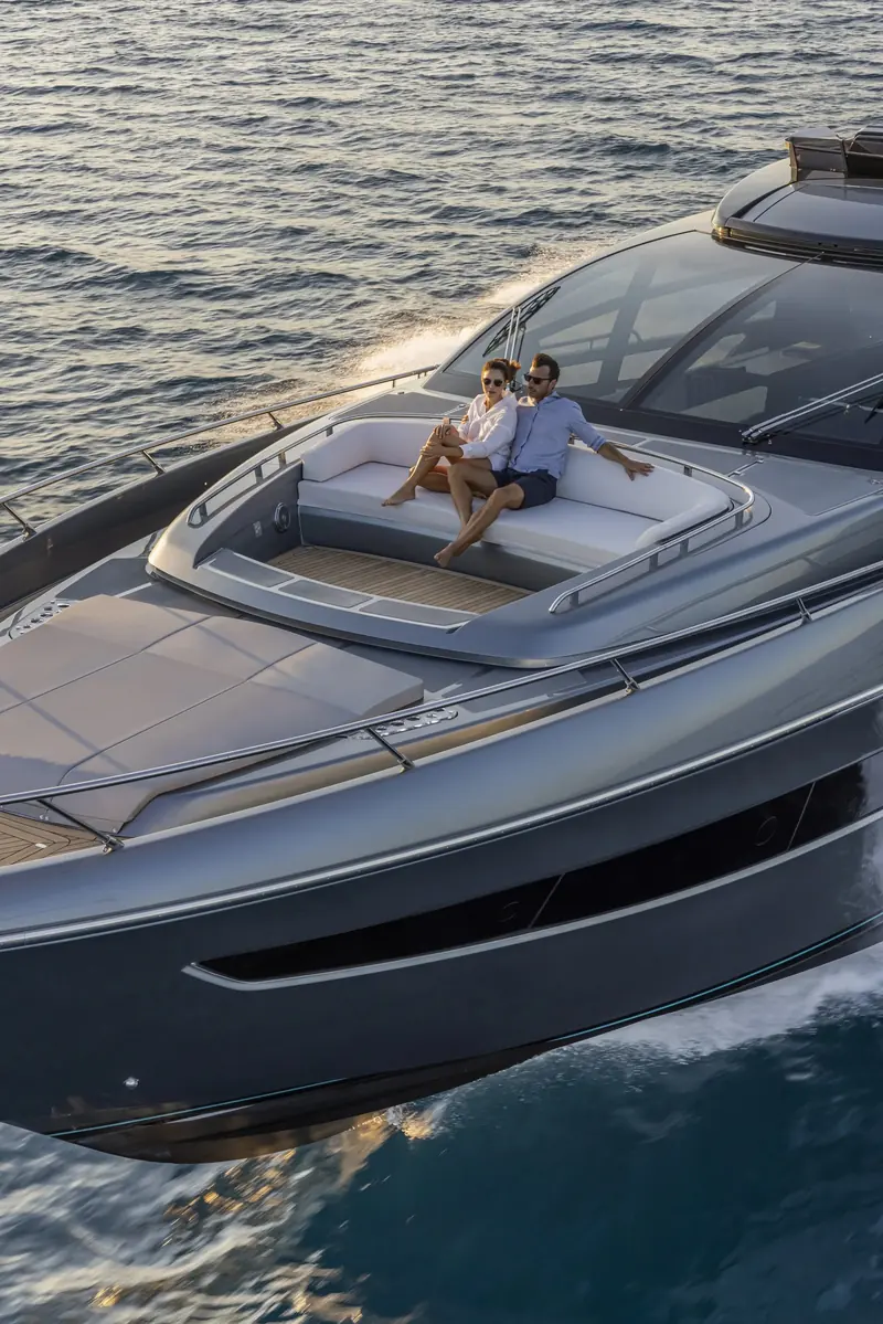 Bow sunpads under way, the fixed carbon-fibre roof overhead distinguishing the Super from the open Perseo.