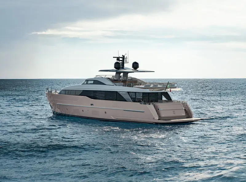 The SD90 cruising in open water, full length from the beam.